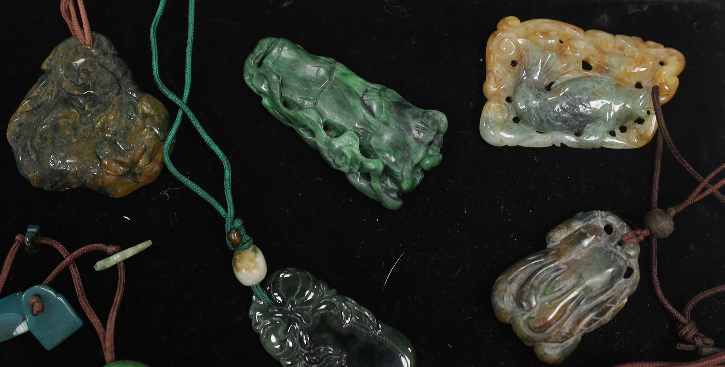 Fourteen Chinese jadeite carvings, largest 6.8cm